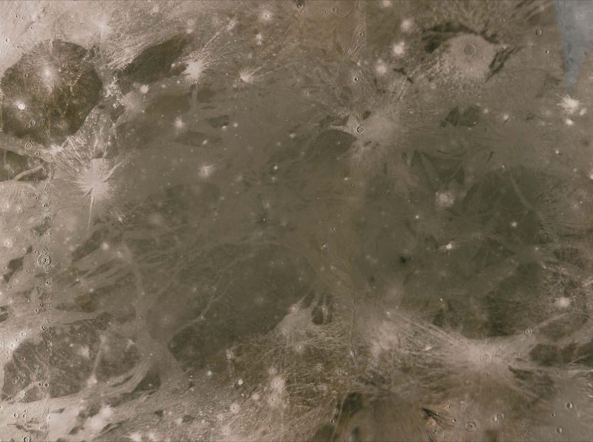 A view of the rough, crater-marked terrain in an equatorial region of Jupiter's moon Ganymede.