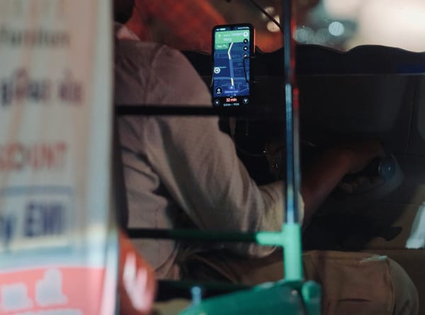 A view of Google Maps open and displaying a route on an auto-driver's phone.